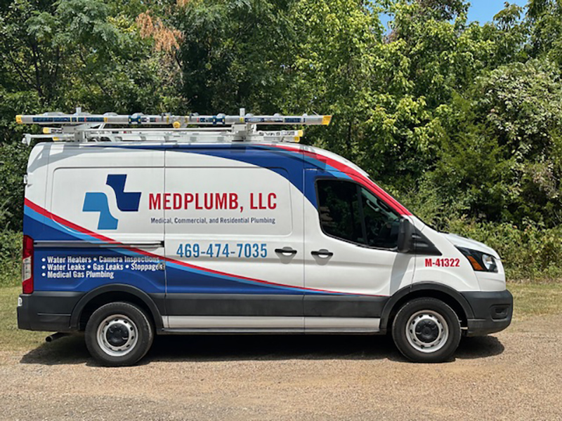 MedPlumb LLC plumbing service van displaying company information, serving the Dallas-Fort Worth metroplex.